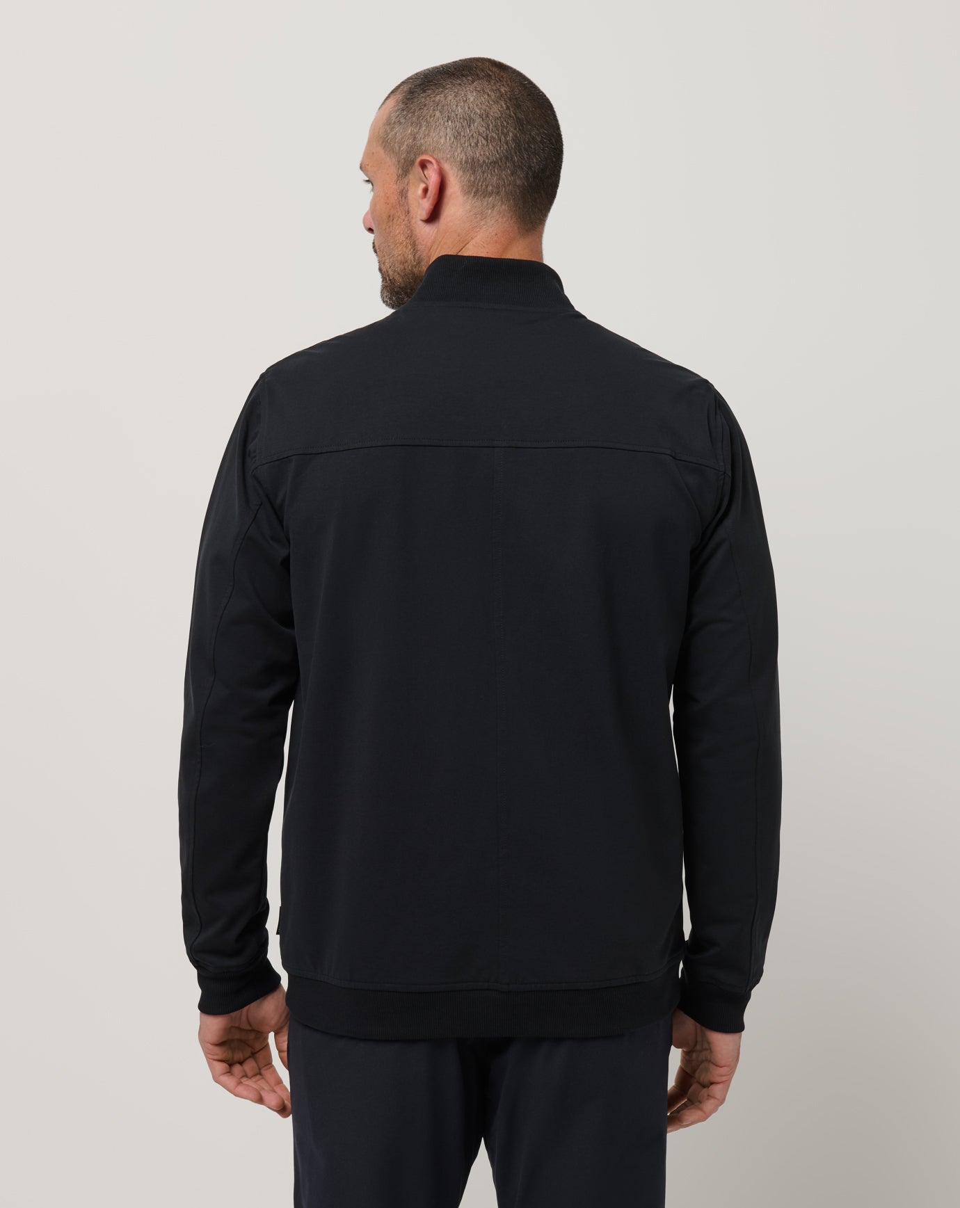 TravisMathew | Stretchknit Bomber Jacket - Black