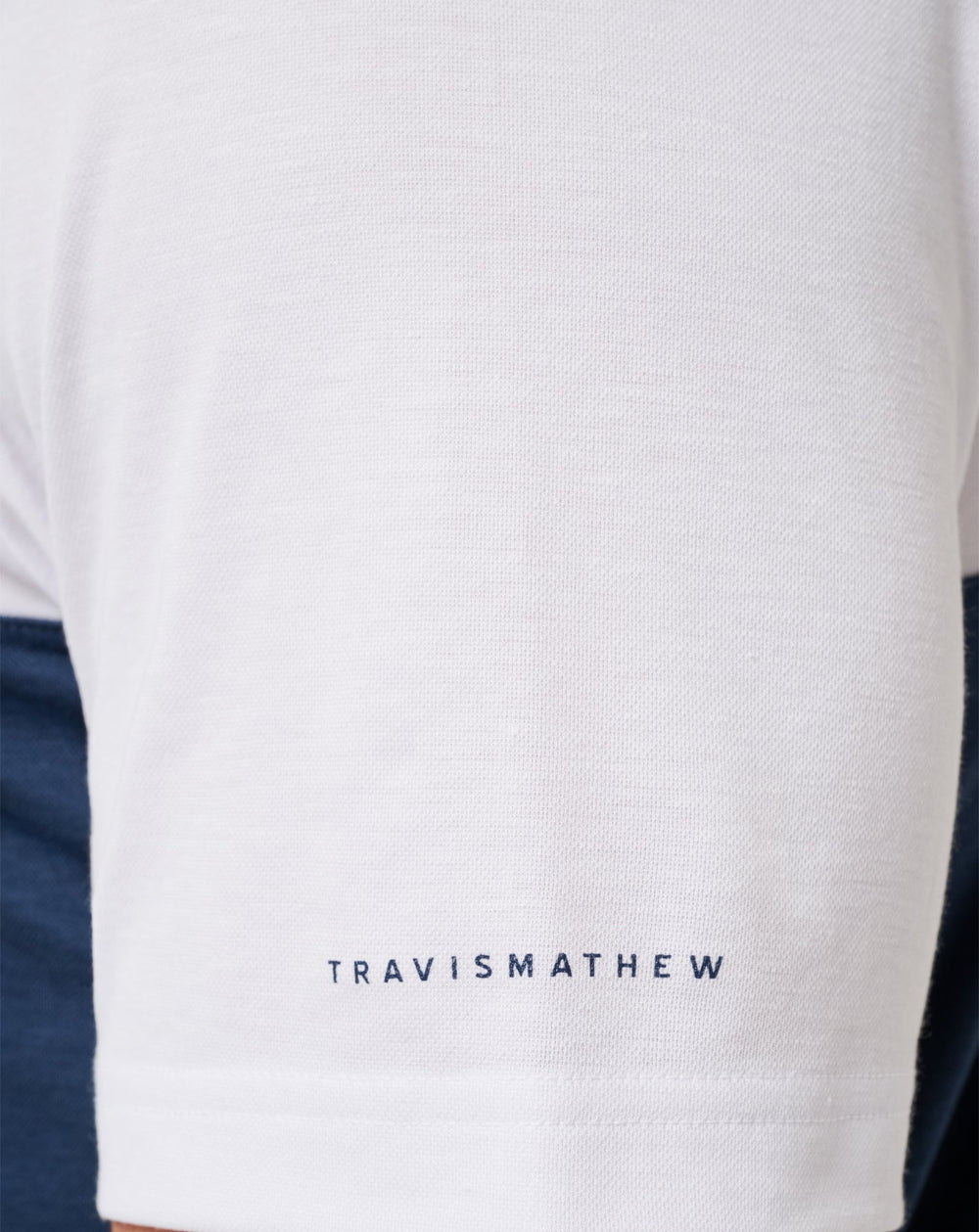 TravisMathew | Michigan Drop Back Polo - White/Navy