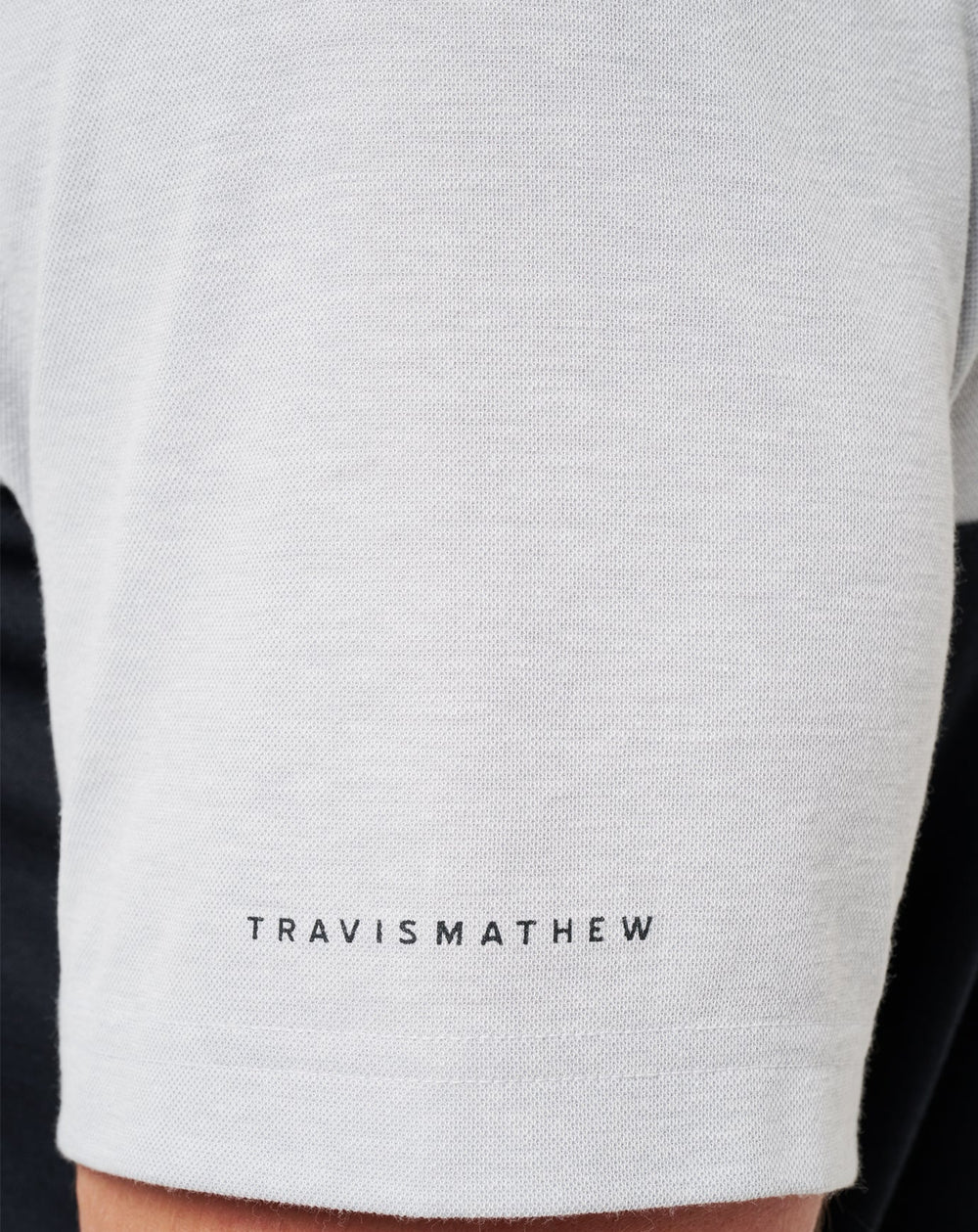 TravisMathew | UT Austin Drop Back Polo - Heather Grey/Black